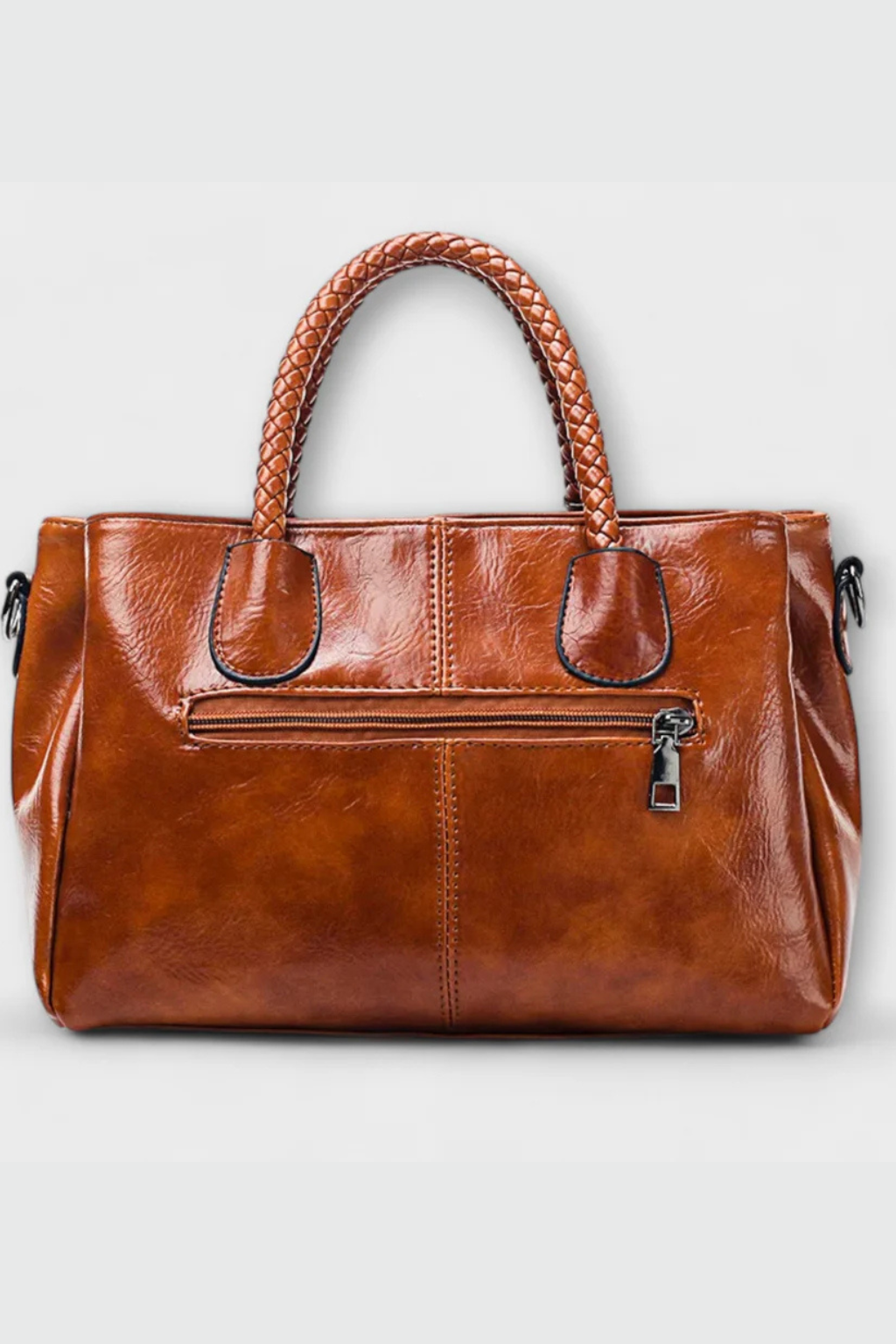 Struktureret Håndtaske med Flettede Håndtag | Elegant Design til Hverdagsbrug 10